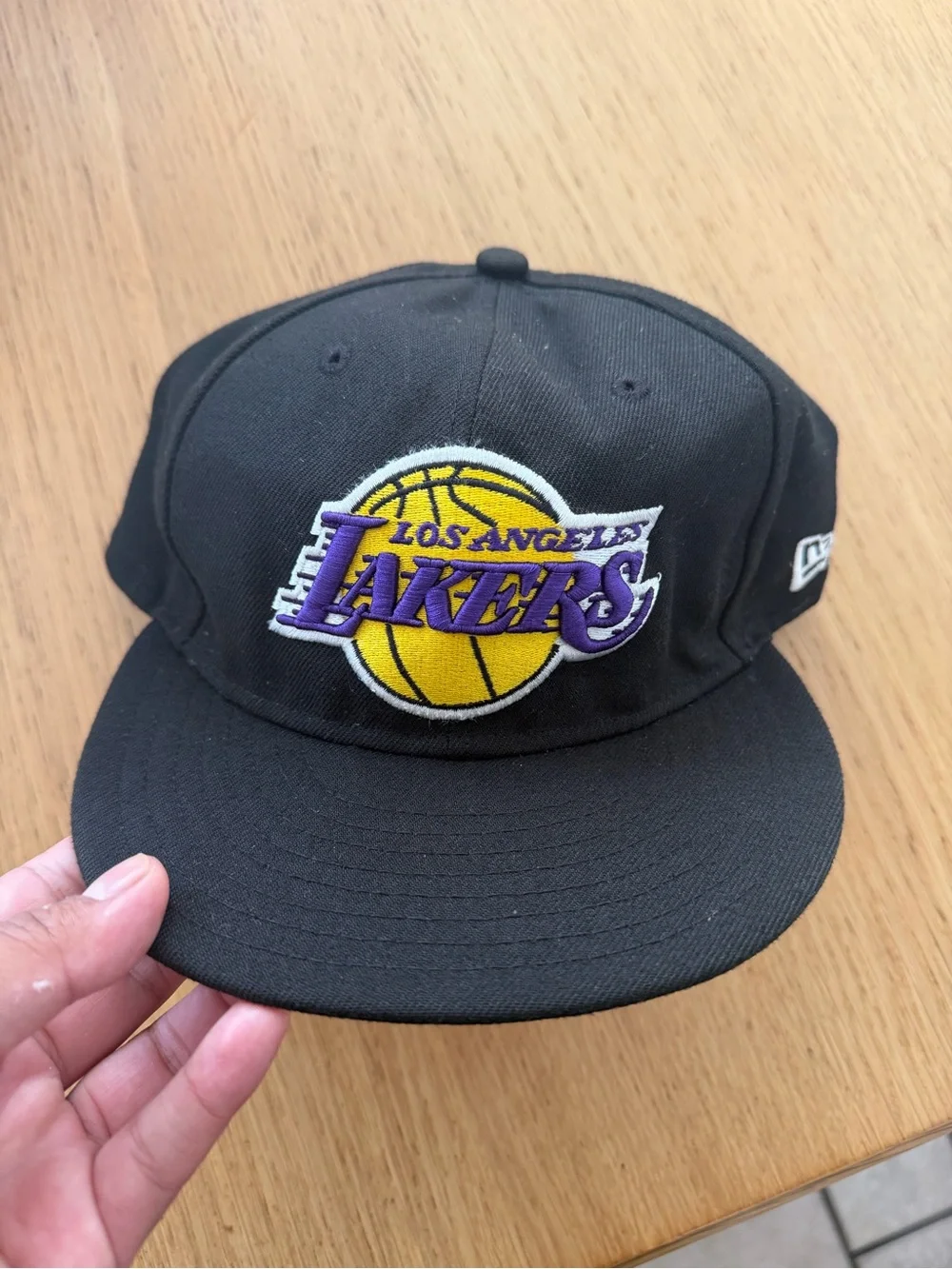 New Era Lakers Black Snapback with Purple and Gold Logo
